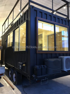 Design moderne personnalisé en acier de couleur Fabriqué Installation rapide maisons modulaires préfabriquées sur roues pour caravane de camping mobile