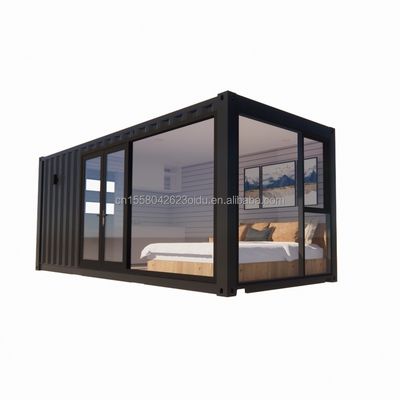 Hôtel 20ft maison de conteneurs modulaire préfabriqué avec une grande chambre solaire en verre d'un seul côté et fenêtres en alliage d'aluminium