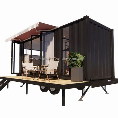 Maison de conteneur mini mobile moderne avec cadre en acier en acier galvanisé et roues en panneau sandwich