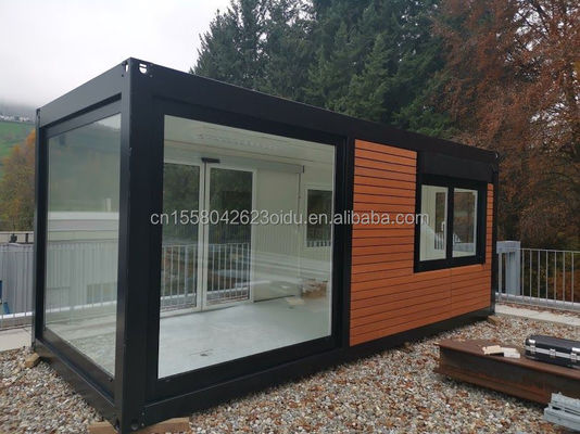 Container modulaire préfabriqué Container en bois Container à emballage plat Aménagement amovible Maison de luxe de 20 pieds Café moderne