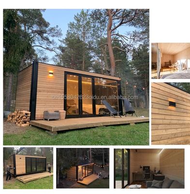 Entrepôt métallique en bois miniature personnalisé Conteneur modernement évolutif Maison préfabriquée pour panneau de sandwich en acier extérieur