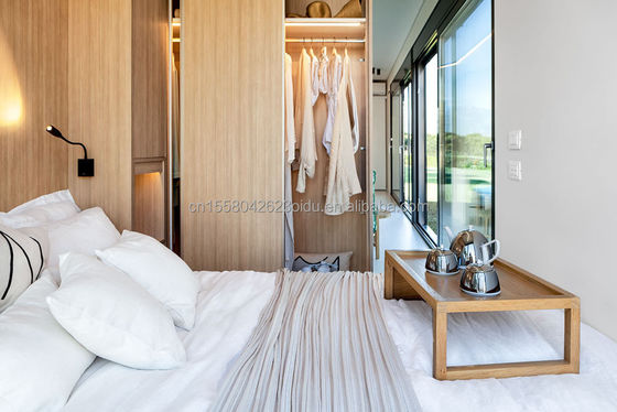 Location d'une maison en bois préfabriquée maison de conteneurs pour un hébergement hôtelier