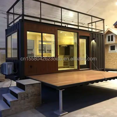Container de 20 pieds de largeur, de design moderne, en acier, préfabriqué, mobile, maison, café-bar, avec terrasse et application extérieure