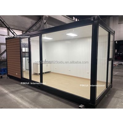 Maison préfabriquée en acier galvanisé à 180 g. Structure en acier de 20 pieds. Maison ensoleillée avec jardin et bois mobile.