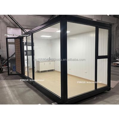 Maison préfabriquée en acier galvanisé à 180 g. Structure en acier de 20 pieds. Maison ensoleillée avec jardin et bois mobile.