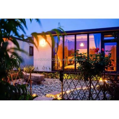 Matériaux écologiques 20 pieds 40 pieds 2 chambres préfabriquées jardin cabine maison portes en verre conteneur maison en bois pour hôtel