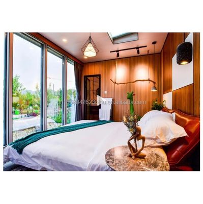 Matériaux écologiques 20 pieds 40 pieds 2 chambres préfabriquées jardin cabine maison portes en verre conteneur maison en bois pour hôtel
