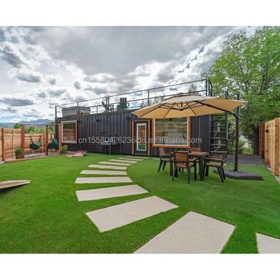 50/75/100mm Panneau sandwich ondulé Mural Container en acier préfabriqué Maison pour hôtel 20 pieds en bois appartement familial préfabriqué