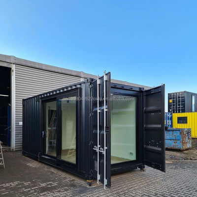 Hôtel d'une chambre à coucher Container de livraison noir Maison en acier Porte de luxe Maison en bois préfabriquée de 20 pieds avec cuisine et salle de bain
