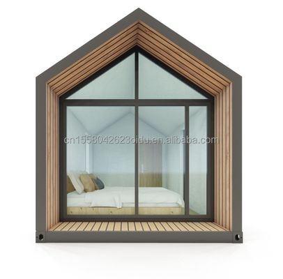 Modern Triangular Resort Hotel maison de conteneurs préfabriquée avec un lit salle de bain cuisine et jardin Fonctionnalités de la porte du panneau sandwich