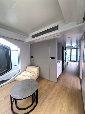 Capsule spatiale insonorisée en couleur préfabriquée maison minuscule avec mur 50/75/100 mm panneau sandwich ondulatoire