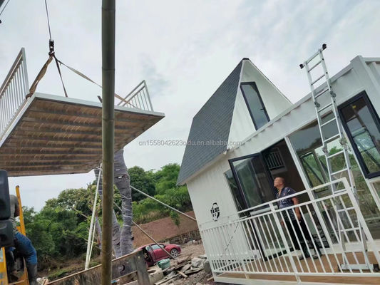 Hôtel cadre en acier galvanisé en acier pliant conteneur d'emballage plat pour 20 pieds clinique médicale salle d'isolement maison de verre personnalisée blanche